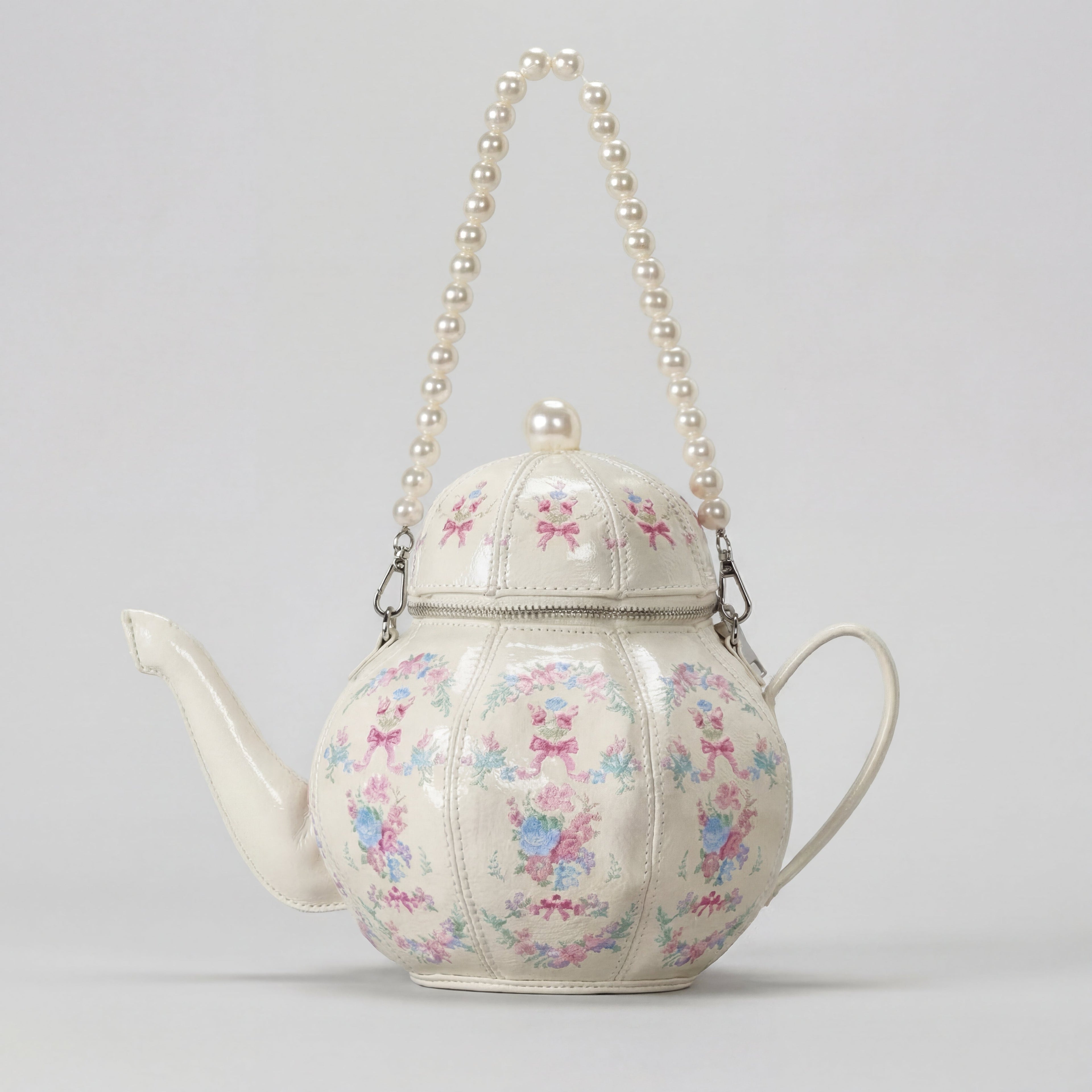 Roséfarbene Teekannen-Tasche aus veganem Leder