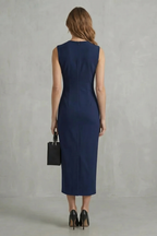 Veloura – Kühner floraler Kontrast – Midikleid